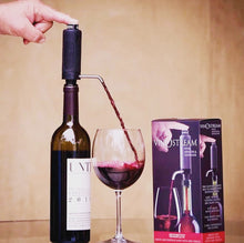 VinOstream dispenser on a wine bottle beside a filled glass and its box
