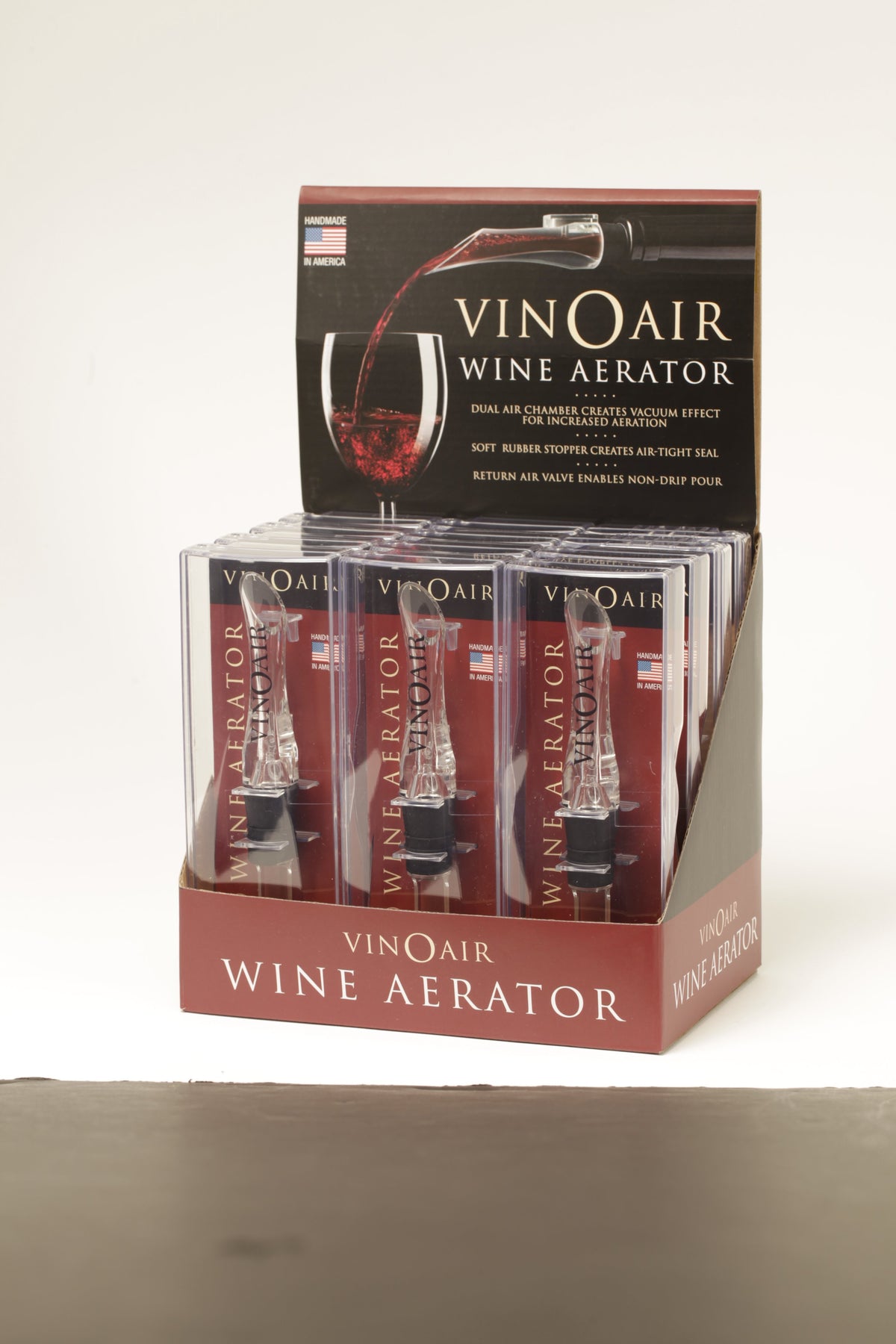 Retail counter display holding several boxed VinOair aerators